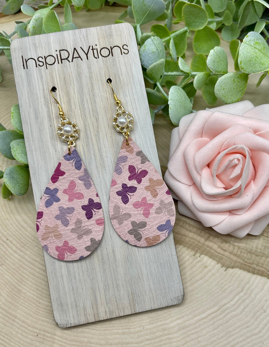 Gorgeous butterfly handmade leather teardrop earrings with pearl accent  - 1